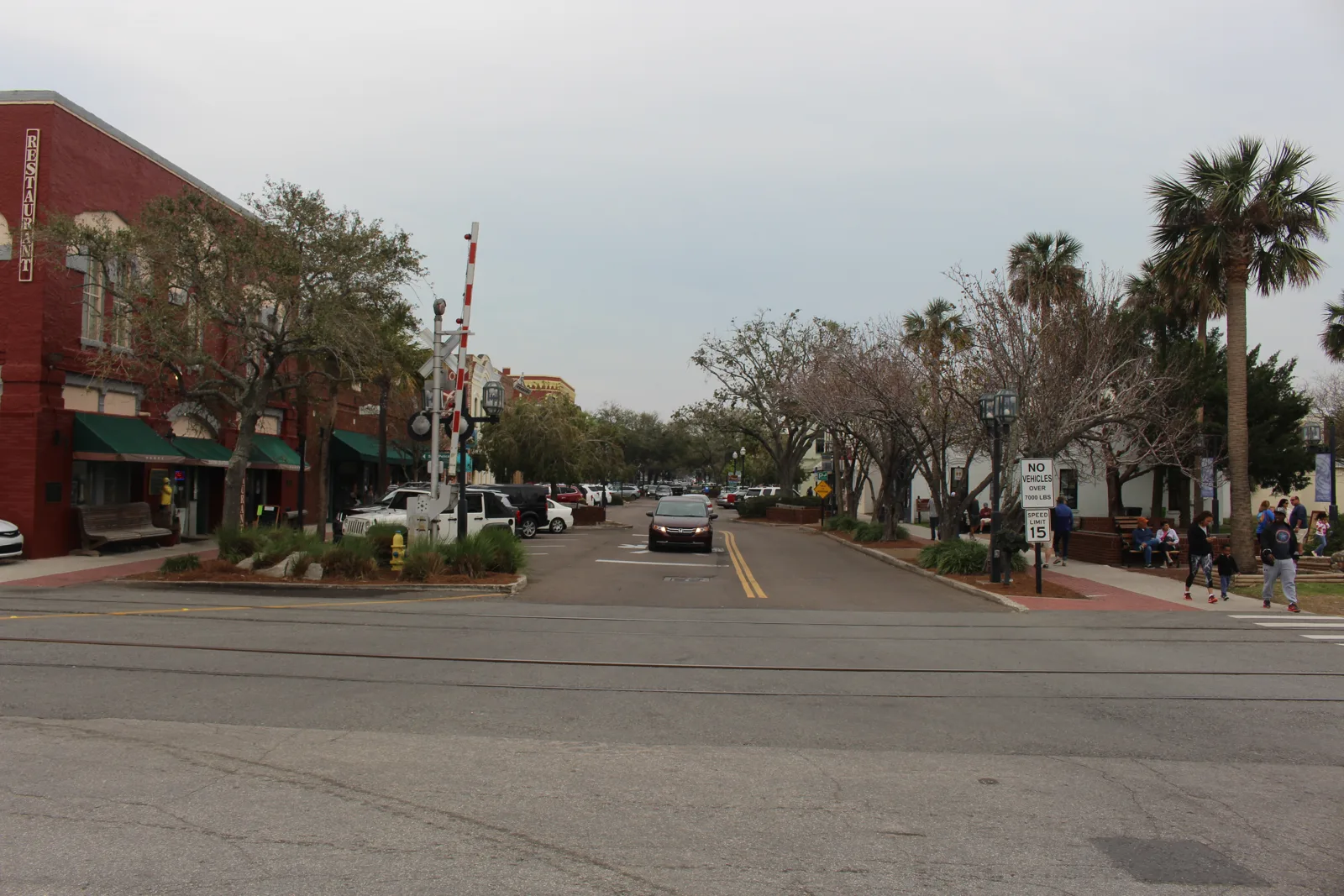 Historic storefronts and palm trees along Centre Street in downtown Fernandina Beach, Florida