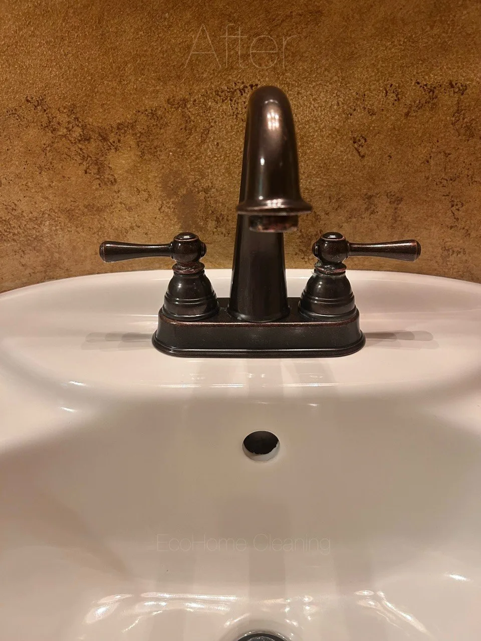 Bronze bathroom faucet and handles after cleaning